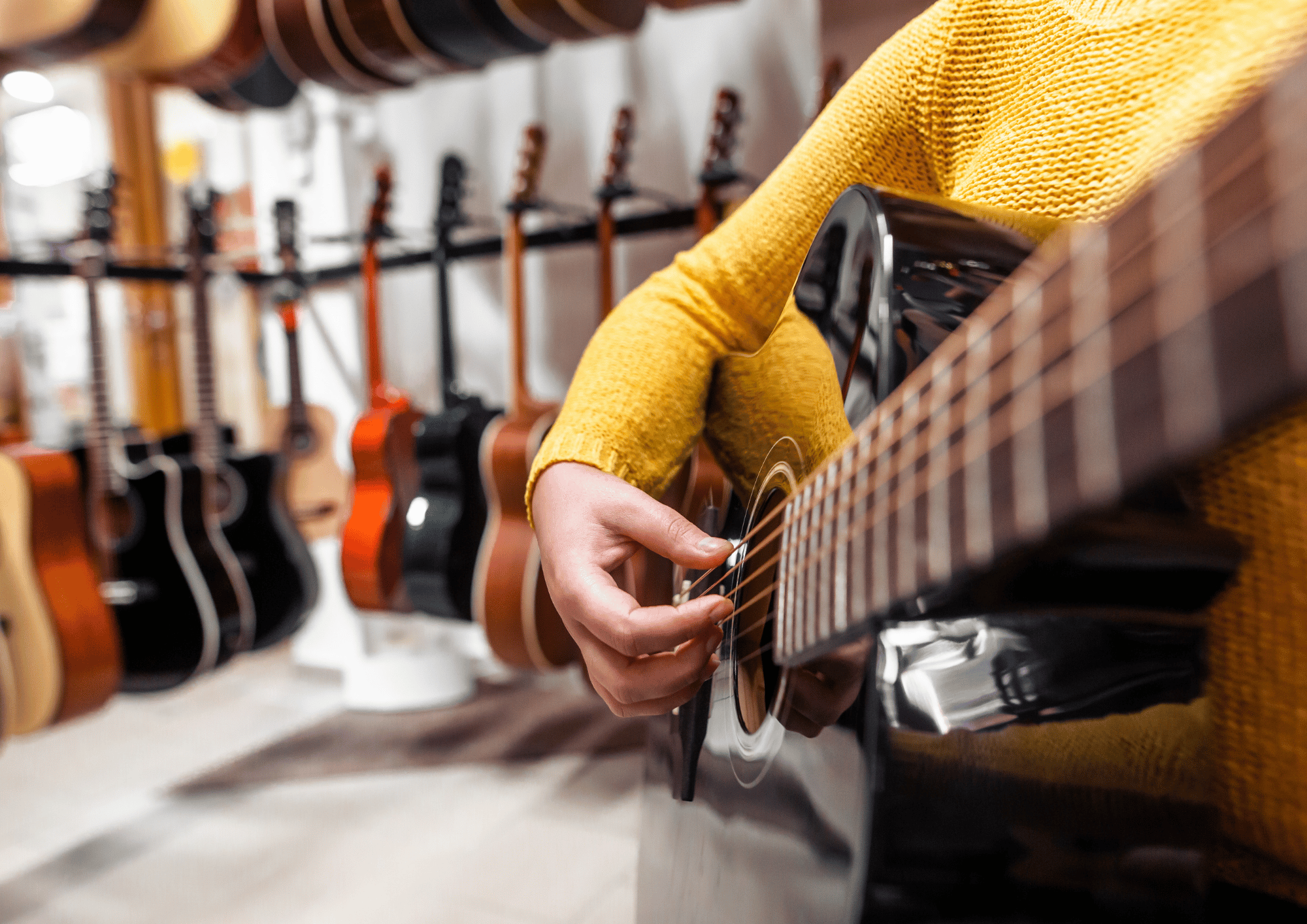 Beginner guitar student choosing a first guitar for lessons in St Neots
